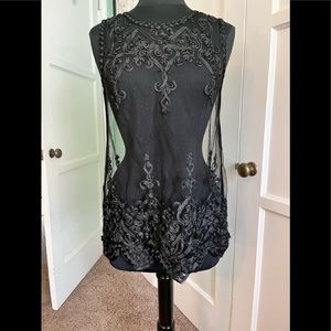 Black sleeveless sheer lace tunic top